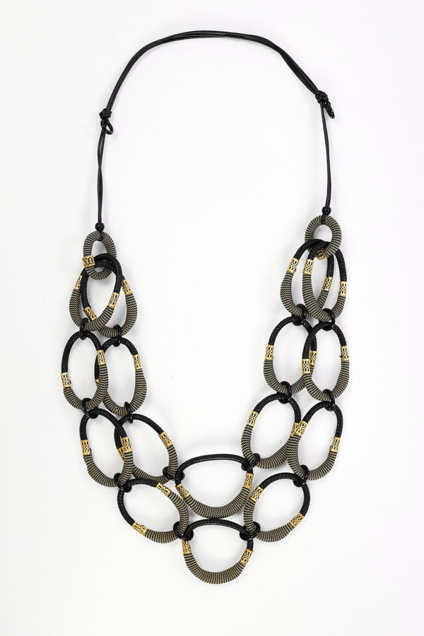 Naya NAW26340 large loop statement necklace in black and muted gold tones
