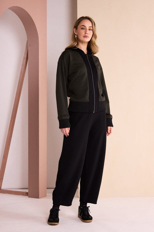Naya women’s balloon leg trousers with side pockets and tapered dart hem