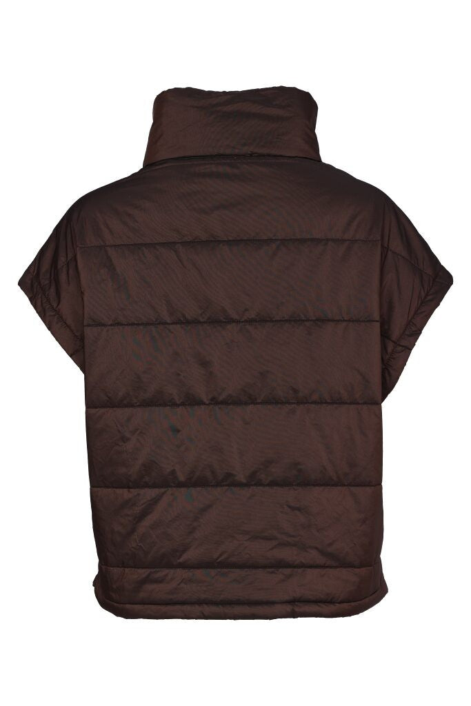 Naya women’s short padded waistcoat styled with wide leg trousers and layered top