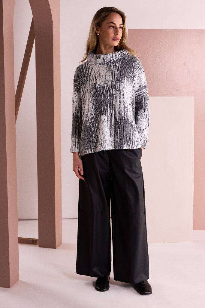 Naya NAW26205 high neck printed top styled with black wide leg trousers