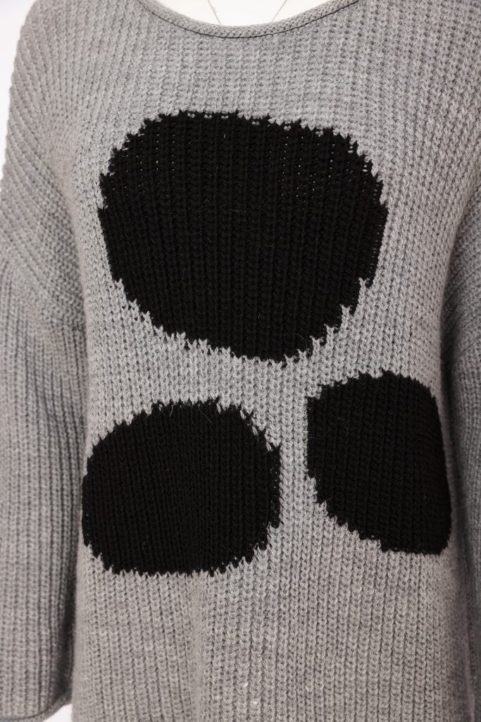 Close-up of Naya NAW26261 chunky grey knit with black circular motifs