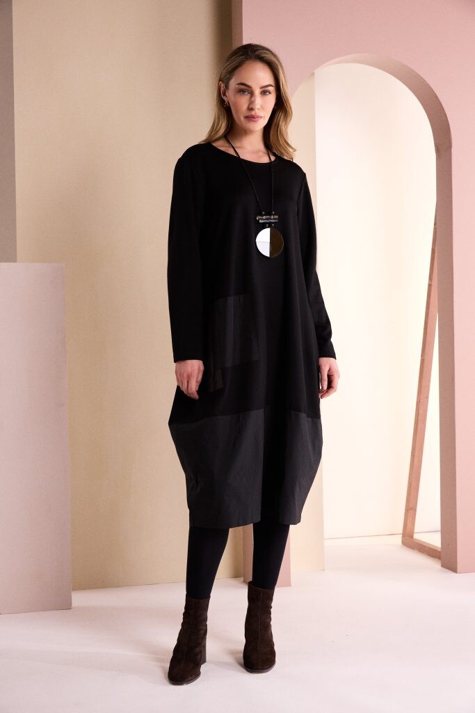 Naya NAW26164 jersey dress showing contrast fabric hem and relaxed tulip shape