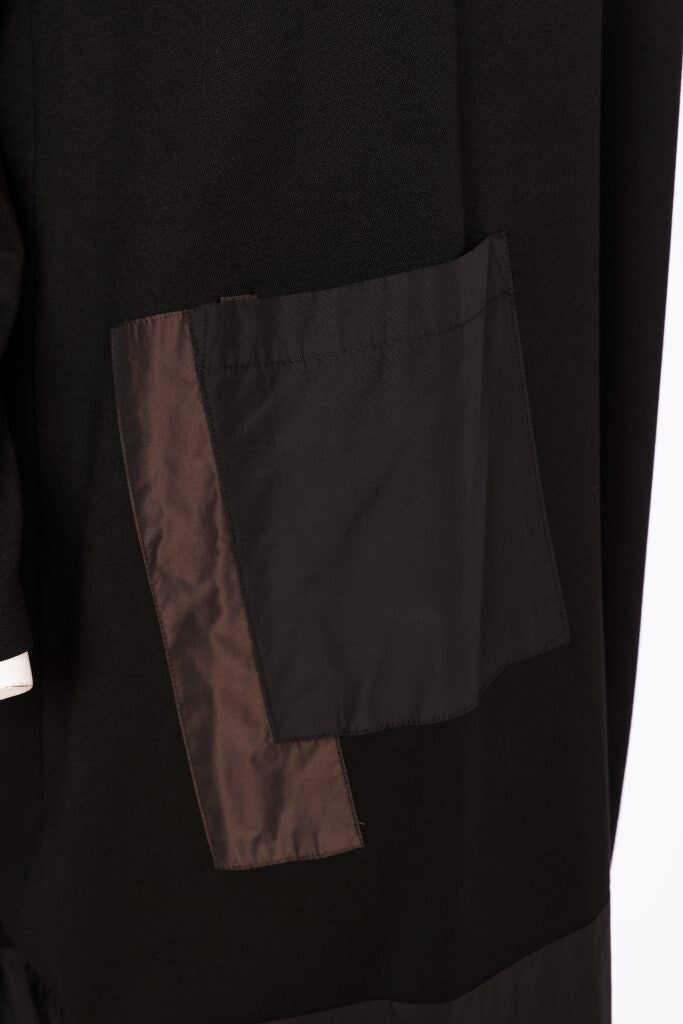 Naya NAW26164 jersey dress showing contrast fabric hem and relaxed tulip shape